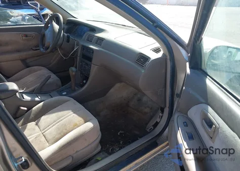 1999 Toyota Camry Le from USA, damaged, VIN JT2BG22K9X0270572